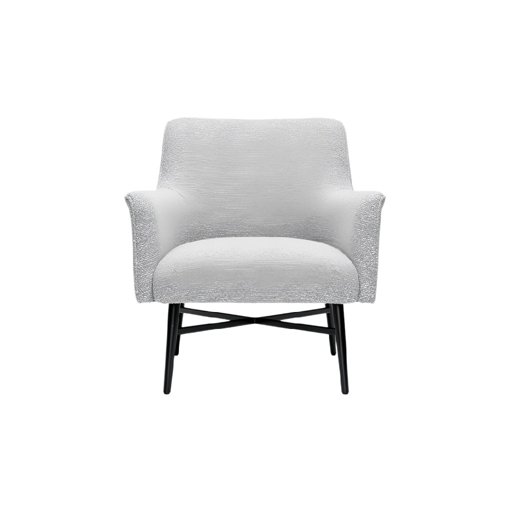 **Moderne fauteuil met een zachte stof en zwart metalen frame**